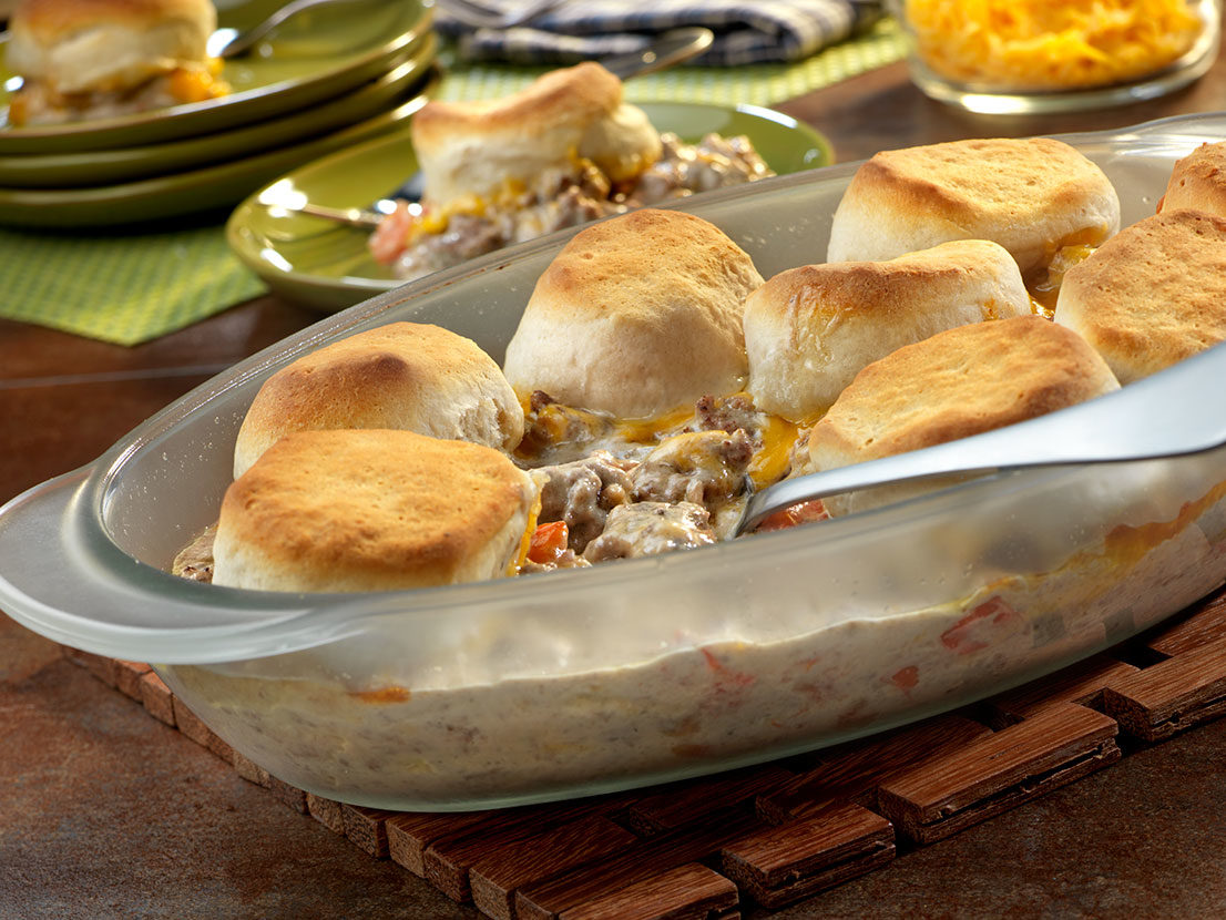 Casserole dish of Cheesy Alfredo Hamburger Casserole made with Prego® sauce