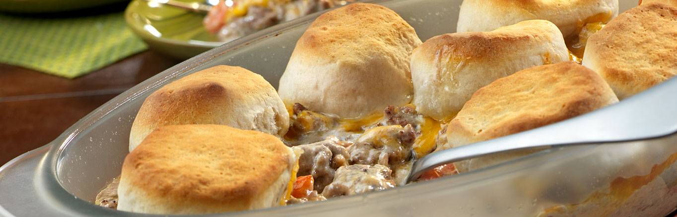 Casserole dish of Cheesy Alfredo Hamburger Casserole made with Prego® sauce
