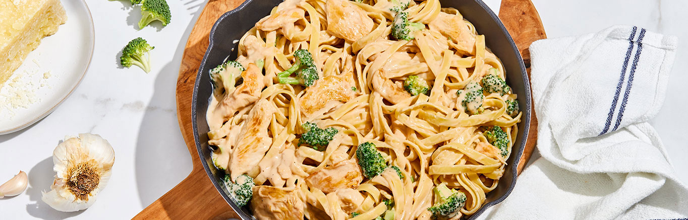 Chicken Broccoli Alfredo with Fettucine in a skillet