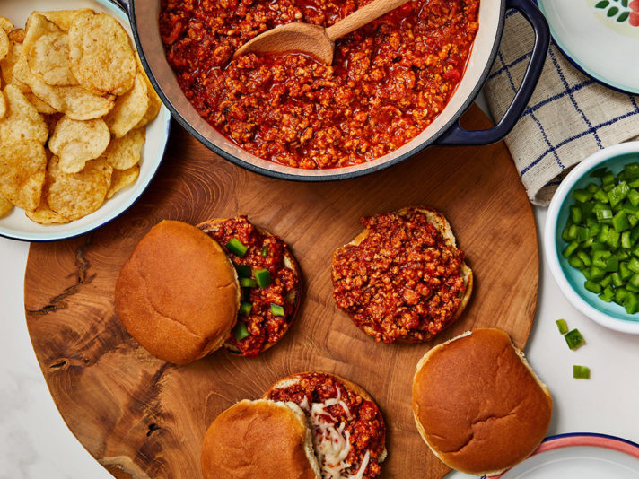 An image of prepared Easy Italian-Style Sloppy Joes made with ground beef or ground turkey, Prego® Traditional Italian Sauce, mozzarella cheese and Pepperidge Farm® Soft White Hamburger Buns.