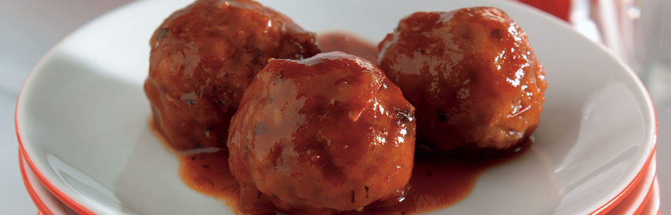 Serving of Easy Slow Cooker Party Meatballs made with Prego® sauce